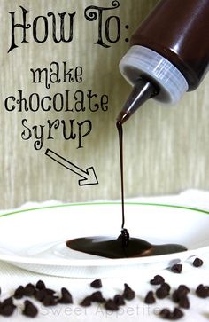 chocolate syrup being poured into a white plate