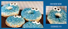 there are four donuts decorated with blue icing and sprinkles that have googly eyes on them