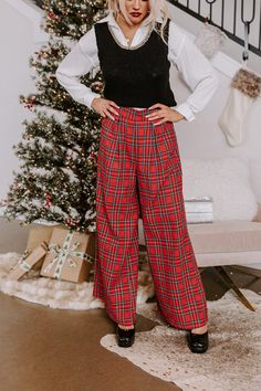 - These trendy pants are the perfect pair for stylish girlies this season! - Fully lined material with a black and blue hued plaid print - A waistline with an elastic back - Functional side pockets - A relaxed silhouette that ends in wide hemlines Metallic Crop Top, Trendy Pants, Plaid Pants, Velvet Tops, Sequin Top, Women Clothing Boutique, Winter Looks, Online Womens Clothing, Christmas Outfit