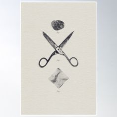 a pair of scissors sitting on top of a piece of paper next to a diamond