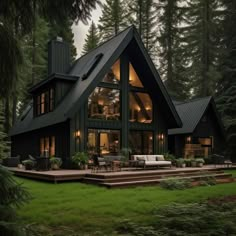 a house in the woods with lots of windows and lights on it's roof