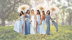 a group of women standing next to each other holding parasols