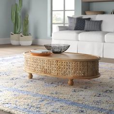 a living room with a couch and coffee table