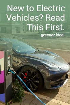 an electric car plugged into a charging station with the words, new to electric vehicles? read this first