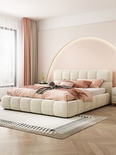 a bedroom with a large bed and pink walls