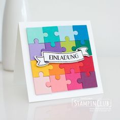 a card made out of puzzle pieces with the word enfadung on it