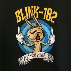 a black shirt with an image of a bunny pointing at the camera and saying blink - 1932