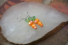 Carrot Dangle Earrings  A nice gift for Easter All products are 100% handmade, made with love especially for you. Please note that due to lighting effects, monitor brightness, contrast and other settings, there may be slight differences in the color tones / tones of the photo on the website and the item itself. Carrot Earrings, Easter Earrings, Snake Necklace, Color Tones, Green Necklace, Easter Gifts, Etsy Earrings Dangle, Diy Earrings, Colour Tone