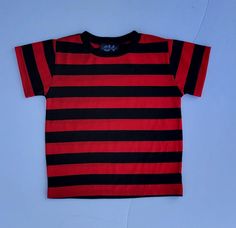 Please check picture this a new fabric if you have ordered before.  thick lines color is darker red Comfy polyester (please check picture) tee features contrast stitching . Made in the USA,fabric number can be tossed in the wash for effortless care after a day of play.  ** WE ALSO OFFER SHORTS ** Stretchy polyester fabric MADE TO ORDER.    Made in the USA Red Striped Tee Outfit, Chucky Striped Shirt, Chucky Shirt Striped, Red And Black Striped Shirt, Halloween Rings, Black And Red Striped Sweater, Black Striped Shirt, Red And Black Shirt, Stripe Tee