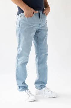 Slim but not tight, these light-wash straight-leg jeans are made with performance-stretch denim to give you all-day flexibility, comfort and shape retention. 15" leg opening; 10 1/2" front rise 98% cotton, 2% spandex Machine wash, tumble dry Imported Straight Fit Jeans Men, Loose Jeans Outfit, Straight Jeans Outfit, Jeans Outfit Men, Types Of Jeans, Dads Clothes, Guys Clothing Styles, Comfortable Jeans, Outfit Jeans