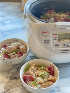 two bowls of food sit in front of an instant pot