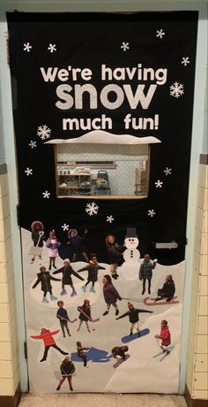 a door decorated with snowmen and people on skis