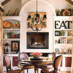 a dining room table with chairs around it