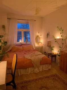 a bed room with a neatly made bed next to a window and a table in front of it