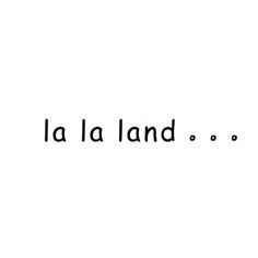 the word la la land is written in black ink on a white background with small dots