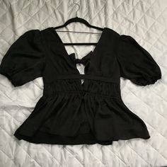 Dolan (By Anthropology) Puff Sleeve Blouse- Xs Black Silky Material In The Front And A Softer Material In The Back New With Tags Pet Friendly, Non Smoking Household. Bin 4 Casual Puff Sleeve Top For Party, Chic Black V-neck Puff Sleeve Top, Chic Black Puff Sleeve Top With Ruffles, Spring V-neck Puff Sleeve Top For Night Out, Ruffled Puff Sleeve Tops For Date Night, Date Night Puff Sleeve Top With Ruffles, Spring Night Out V-neck Puff Sleeve Top, Puff Sleeve Ruffle Top For Date Night, Trendy Short Sleeve Blouse For Evening