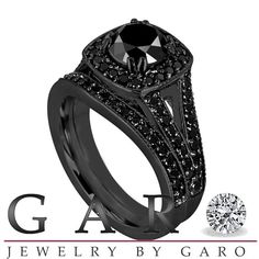 a black diamond engagement ring with the words ga jewelry by garo on it's side