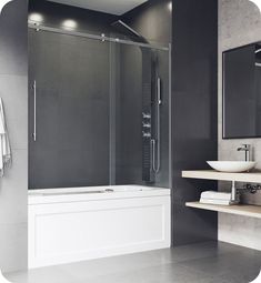 a bathroom with a sink, mirror and bathtub next to the shower stall is shown