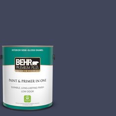 a blue paint can with the words behr premium plus painted on it's side