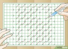 two hands holding a pen over a graph paper with lines drawn on it and another hand pointing