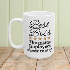 a white coffee mug that says best boss the reason employees choose to stay on it