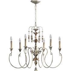 a chandelier with five lights hanging from it's center and four arms