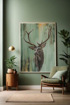 a living room with green walls and a deer painting on the wall next to a chair