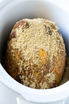 a crumbly baked bread in a slow cooker with some brown sugar on top