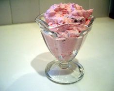 a dessert in a glass dish on a table