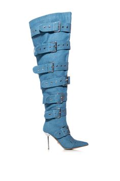 Just what your denim collection is yearning for. The AZALEA WANG Nyxie Denim Belt Boot is crafted from a denim textile upper and features a pointed toe silhouette, a slim silver metallic stiletto heel, and a sexy thigh-high shaft. Complete with buckled accents, adjustable strappy belted detailing, silver metallic grommet hardware, and a tonal inner ankle zipper closure. Style with a metallic mini dress and your fave silver jewelry to finish off your sultry look. (all measurements are approximate from size 7.5) - Denim Textile Upper - Pointed Toe - Slim Stiletto Heel - Thigh-High Shaft - 4” Heel Height - 23.5” Shaft Height - 20.75” Top Shaft Circumference - Imported Product ID: 379947 Thigh High Denim Boots, Blue Thigh High Boots, Wolf Outfit, Metallic Mini Dress, Metallic Mini Dresses, Azalea Wang, Denim Belt, Denim Boots, Chic Leather