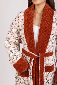 DESCRIPTION: Elevate your loungewear game with our Victoria Quilted Robe. This plush velvet red robe is the epitome of coziness and elegance, perfect for making a statement. Crafted using traditional block printing techniques, this robe is truly one-of-a-kind. With its reversible design, you can switch up your look effortlessly. The inside of the robe is lined with luxurious velvet quilting, ensuring maximum warmth and comfort. Complete with patch pockets and a belt, this robe offers both style Quilt Robe, Quilted Housecoat, Victorian Robe, Fancy Robe, Bathrobe Pattern, Womens Robes Long, Fancy Robes, Quilted Robe, Winter Robes