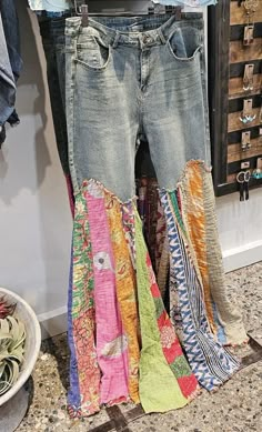 a pair of jeans that are stacked on top of each other