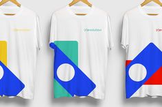 three t - shirts with different colored shapes on them