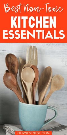 wooden utensils in a teal cup with text overlay that reads best non - toxic kitchen essentials