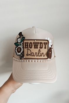 This custom made trucker patch hat is perfect for any occasion whether it be for spring/summer time, a lake hat, a gift for someone, or just a cute accessory to add a little spice to your outfit 🧢✨ DETAILS-  * This hat is one size with an adjustable SnapBack that is adjustable from 20in. - 23.5in. * The color of this hat is Tan * The material of the hat is polyester with iron on patches  REFUNDS AND CANCELLATIONS- Every hat is handmade by me as a result, a slight variation can occur from the pi Spring Trucker Hat With Flat Brim, Adjustable Country Style Trucker Hat For Spring, Cream Snapback Trucker Hat For Spring, Snapback Hats For Country Events In Spring, Country Style Adjustable Trucker Hat For Spring, Spring Trucker Cap, Spring Snapback Hats For Country Events, Brown Trucker Hat Baseball Cap For Spring, Cream Trucker Hat With Curved Brim For Spring