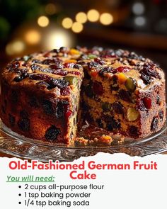 an advertisement for old - fashioned german fruit cake on a glass platter with the words, you will need 2 cups all purpose flour flour flour