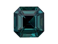 an emerald colored diamond on a white background