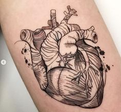 a black and white drawing of a human heart on the right side of the thigh