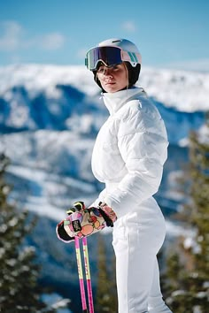 The perfect puffer combo, this ski suit features a warm, waterproof fabrication with a puffer silhouette top and flattering, fitted bottom with an ultra-high elasticated waistband and wide ribbed collar. **Fit:** Fitted bottoms; puffer silhouette top **Features:** Waterproof puffer shell; 5k/5k waterproof bottoms; water-resistant zippers; ribbed, elasticated waistband, ribbed oversized collar, ribbed wrist detail; full-length zipper opening; puffer top is filled with recycled polyester **Why We All White Ski Outfit, Puffer Ski Jacket, Snow Skiing Outfits For Women, Warm Clothes For Winter, White Ski Outfit, Women Ski Outfit, Cute Ski Outfits For Women, Denver Winter, Snow Suit Womens