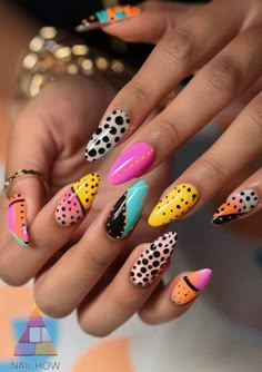 Showcase your playful side with these stunning short nail designs, offering a different nail design on each nail. With a combination of polka dots, vibrant colors, and unique patterns, these nails are the essence of fun. Find more inspiration at nailhow.com! Nails Pattern Ideas, Simple Nail Designs With Dots, Nail Designs Pop Art, Colorful Abstract Nail Art, Abstract Colorful Nails, Unique Short Nails, Colorful Polka Dot Nails Art Designs, Cool Nail Ideas, L Nails