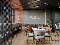 the interior of a restaurant with tables and chairs in front of a brick wall that reads super burgerer