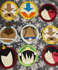 several circular stickers with different designs on them