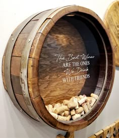 a wooden barrel with wine corks in it