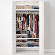 an organized closet with clothes and shoes