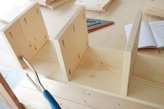 a pair of pliers sitting on top of wooden boxes