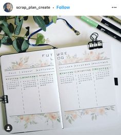 an open planner sitting on top of a table