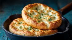 some bread is sitting in a pan on a table