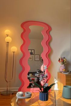 Pink wavy mirror. Tall mirror Ultrafragola Mirror Aesthetic, Curvy Mirrors, Room Inspo Colorful, Funky Home Office, Funky Apartment Decor, Colourful Mirror, Warm Apartment Aesthetic, Room Decor Maximalist, Funky Apartment