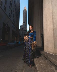 Blue satin crop top and blue lehenga skirt by Harleen Kaur. Long sleeve crop top is designed with a v-neck and a geometric open back closure. Styled with a high waisted floral sequin lehenga skirt lined in navy satin. The perfect blue duo to take on Pantone's color of 2020. A gorgeous outfit for any south asian wedding event or reception! Or mix and match these pieces according to your lifestyle. Switch the skirt with high waisted jeans or switch the top with a tee for a street style look. Lehenga Skirts, Indian Clothing Store, Blue Lehenga, Metallic Party, Sequin Crop Top