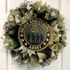 a wreath made out of dollar bills with the words brave and strong army on it